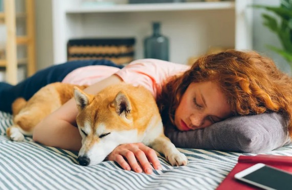 A new study about sleeping with pets in your bed has some surprising results
